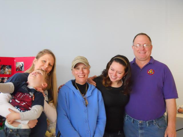 Melissa Hensel and Jayden, Laurie, Janis, and Bob Holcombe at Open house for new training center. April 2,2011